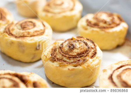 Homemade pastries, Sinabon buns, baking preparations, dough. 89836868