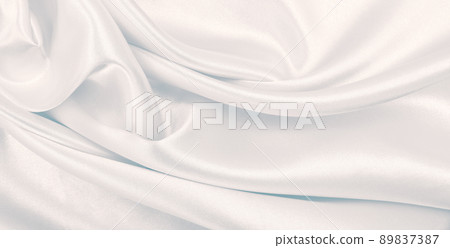 Smooth elegant grey silk or satin luxury cloth as wedding background. Luxurious background design Smooth elegant grey silk or satin luxury cloth as wedding background. Luxurious background design 89837387