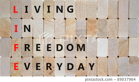 LIFE living in freedom everyday symbol. Concept words LIFE living in freedom everyday on wooden blocks on a beautiful wooden background. Business LIFE living in freedom everyday concept. Copy space. LIFE living in freedom everyday symbol. Concept words LIFE living in freedom everyday on wooden blocks on a beautiful wooden background. Business LIFE living in freedom everyday concept. Copy space. 89837964