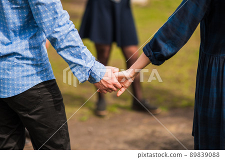 Hands of young people in the nature Hands of young people in the nature 89839088