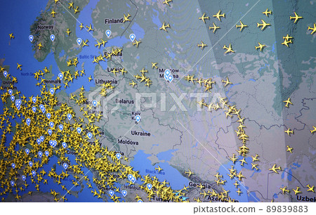 Real air routes visualization depicting planes avoiding certain Eastern European areas due to Russian-Ukranian military conflict 89839883