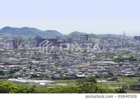 Blue forest and Omuta city from Meotoiwa of Omuta Amagiyama 89840509