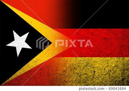 The national flag of Germany with East Timor National flag. Grunge background The national flag of Germany with East Timor National flag. Grunge background 89841684