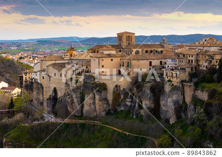Cuenca cityscape with cathedral on spur above gorge 89843862