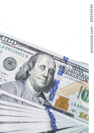 A lot of dollar bills on a white background 89844936