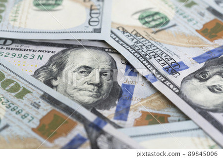 A lot of dollar bills on a white background 89845006
