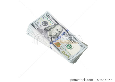 A lot of dollar bills on a white background 89845262