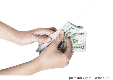 Hand holding a stack of dollars isolated on white background 89845268