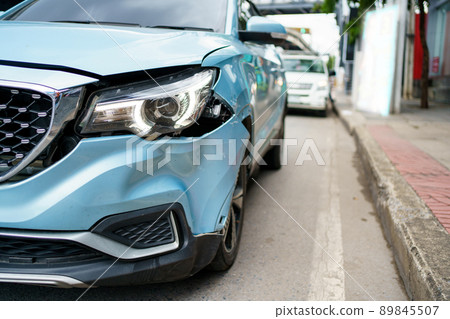 Front of the modern vehicle have a heavy - major damaged. Car crash - accident on the road. Front of the modern vehicle have a heavy - major damaged. Car crash - accident on the road. 89845507