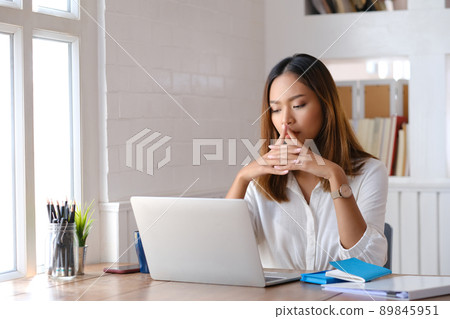 Businesswoman tired of stress from work. Businesswoman tired of stress from work. 89845951