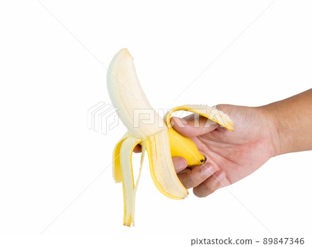 Hand holding 1 banana, ripe golden yellow The ready-to-eat casing is rich in nutrients. Great effect shot in a studio on a white background with clipping paths and copy space isolated. Hand holding 1 banana, ripe golden yellow The ready-to-eat casing is rich in nutrients. Great effect shot in a studio on a white background with clipping paths and copy space isolated. 89847346