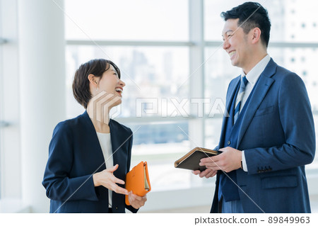 A businessman I met in the office for the first time in a long time 89849963
