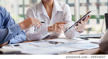 Group of IT consultant working by digital tablet and management big data and analyze financial document of company. 89850687