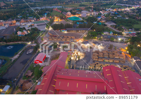 Aerial view of factory industry with smoke and toxic air from chimney in energy and pollution environment concept with city town landscape background. 89851179