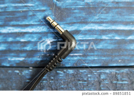 Wired earphone jack on the blue table 89851851