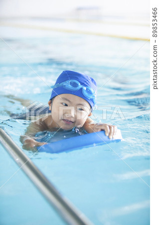 Boys swimming in the pool Boys swimming in the pool 89853466