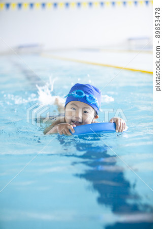 Boys swimming in the pool Boys swimming in the pool 89853478