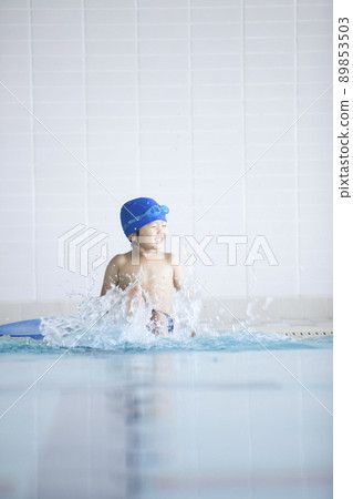 Boys swimming in the pool Boys swimming in the pool 89853503