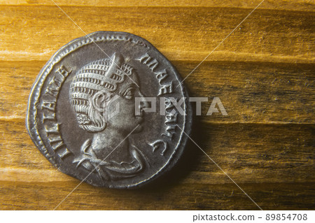 Coin of ancient Rome with a portrait of Julius Mameus Coin of ancient Rome with a portrait of Julius Mameus 89854708