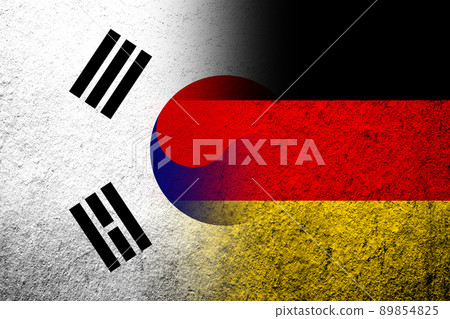 The national flag of Germany with National flag of South Korea. Grunge background 89854825