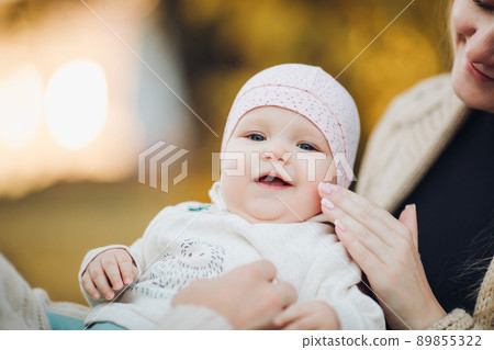 Close up of surprised baby's face with lightly Close up of surprised baby's face with lightly 89855322