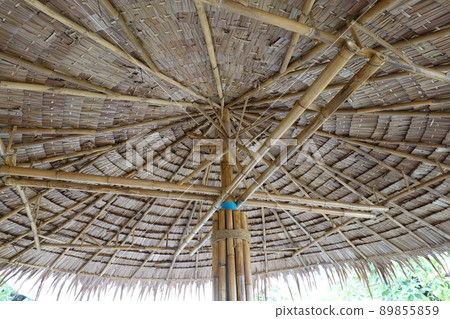 Main bamboo structure with dried palm leaves. Roof top of dried palm trees Main bamboo structure with dried palm leaves. Roof top of dried palm trees 89855859