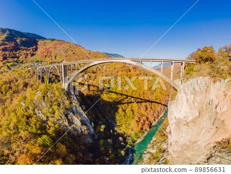 Montenegro. Dzhurdzhevich Bridge Over The River Tara foggy morning 89856631