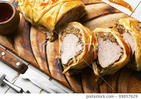 Wellington meat is a festive tenderloin dish. 89857629