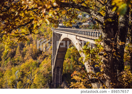 Montenegro. Dzhurdzhevich Bridge Over The River Tara foggy morning 89857657