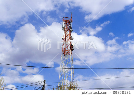Telecommunication tower, antenna and satellite dish, wireless signal and banking services. The concept of connecting to an online service Telecommunication tower, antenna and satellite dish, wireless signal and banking services. The concept of connecting to an online service 89858181