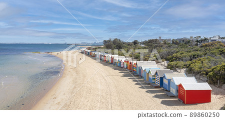 Beautiful Bathing houses on white sandy beach Beautiful Bathing houses on white sandy beach 89860250