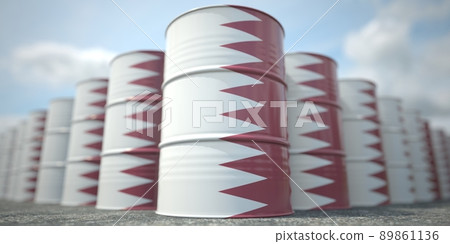 Many barrels with flag of Qatar. Oil or chemical industry supply related 3D rendering Many barrels with flag of Qatar. Oil or chemical industry supply related 3D rendering 89861136