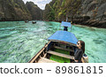 Beautiful women relax on the boat in Beautiful sea and blue sky at Phi phi island 89861815