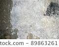 cracked surface of an old wall 89863261