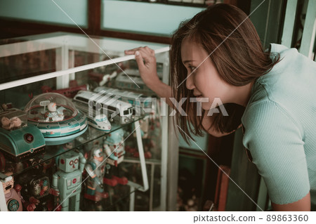 Vintage toy in the glass display cabinet 89863360