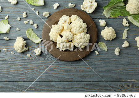 Concept of tasty food with cauliflower on wooden background Concept of tasty food with cauliflower on wooden background 89863468