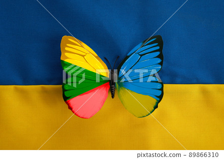 Lithuania Ukraine flag colors butterflay. Pray for Ukraine. Ukraine and Lithuania as a symbol of support and patriotism 89866310