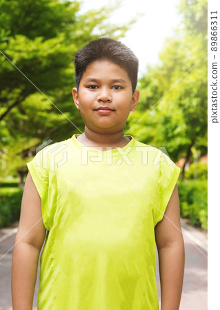 Portrait handsome asian sport boy in garden 89866311