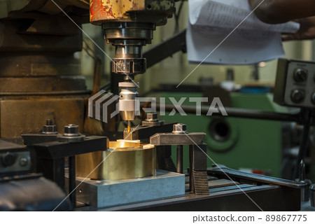 The drilling process on NC milling machine. 89867775