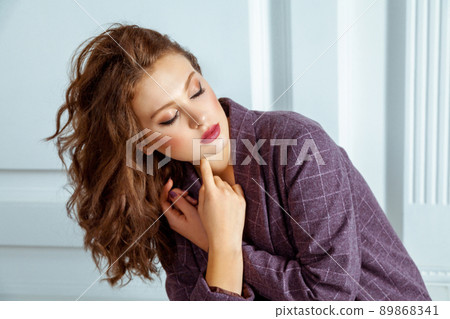 Portrait of sensual closed eyes model, with perfect elegant makeup. Studio shot 89868341