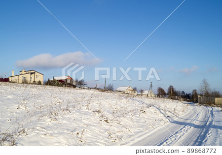 Winter landscape in rural terrain 89868772
