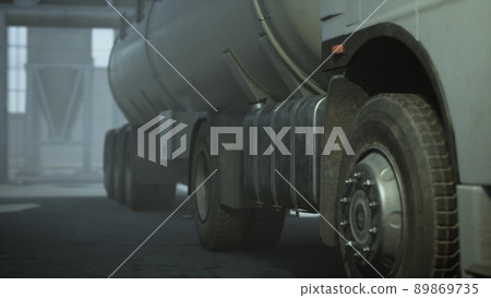large white cistern trucks in a factory 89869735