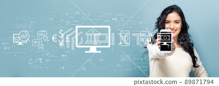 Fintech theme with woman holding a smartphone 89871794