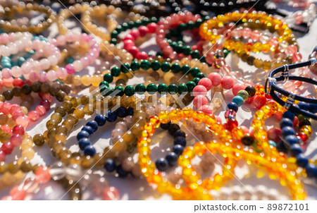 Background of Many bracelets made of various stones Background of Many bracelets made of various stones 89872101