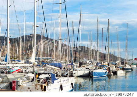 Marina yachts mountains storm Italy 89873247