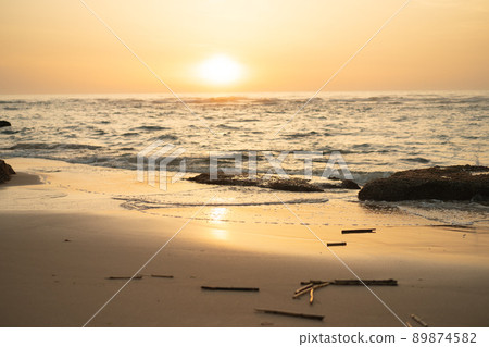 Sea landscape at sunset, stone coast Dramatic ocean background at evening dusk Sea landscape at sunset, stone coast Dramatic ocean background at evening dusk 89874582