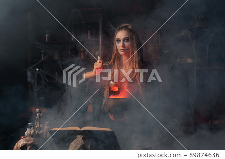 Halloween, witch use magic book and cauldron prepare poison or love potion 89874636