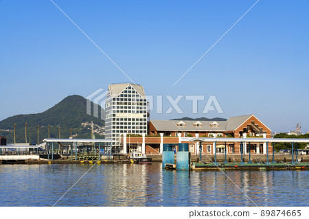 [Nagasaki Prefecture] Sasebo Port Terminal in fine weather (a good natural port that has prospered as a military port since ancient times) 89874665