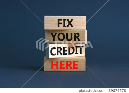 Fix your credit here symbol. Concept words Fix your credit here on wooden blocks on a beautiful grey table grey background. Business, finacial and fix your credit here concept. Fix your credit here symbol. Concept words Fix your credit here on wooden blocks on a beautiful grey table grey background. Business, finacial and fix your credit here concept. 89874778