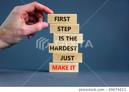 Make first step symbol. Wooden blocks with words First step is the hardest just make it. Beautiful grey table grey background. Businessman hand. Business and make first step concept. Copy space. Make first step symbol. Wooden blocks with words First step is the hardest just make it. Beautiful grey table grey background. Businessman hand. Business and make first step concept. Copy space. 89874813